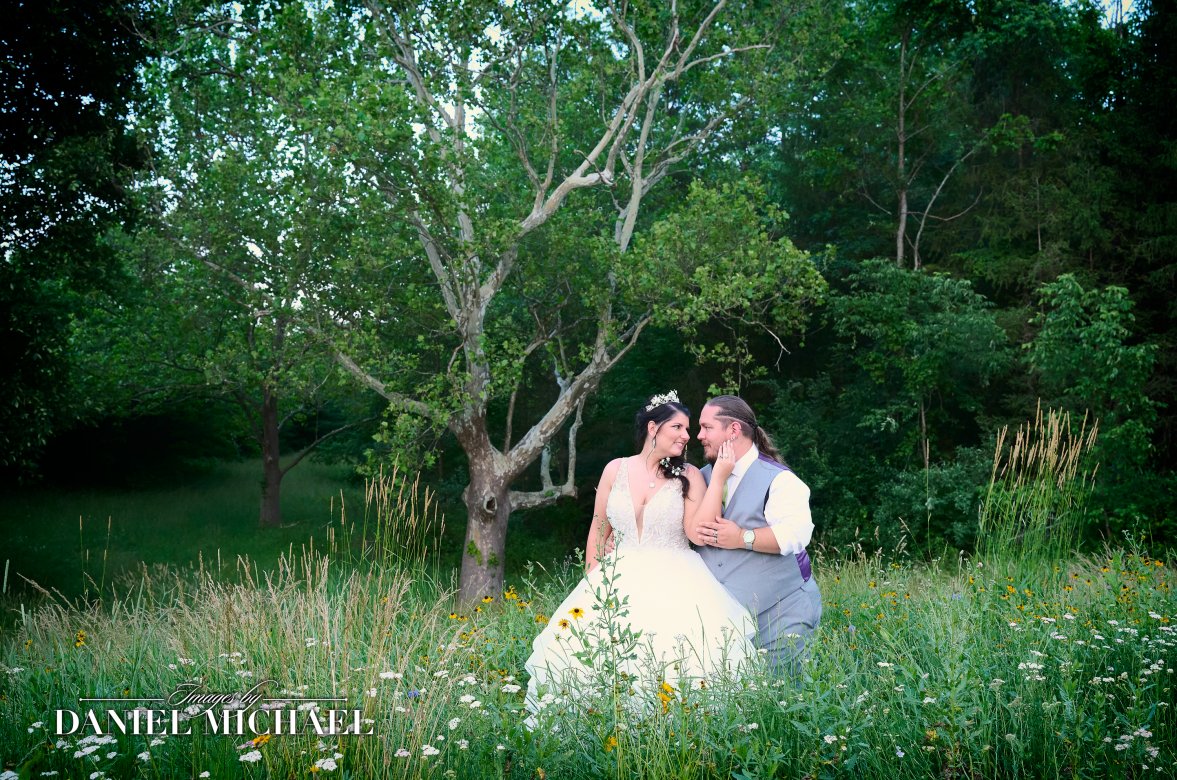 Intimate Natural Wedding Photo among Wildflowers at Whispering Hearts